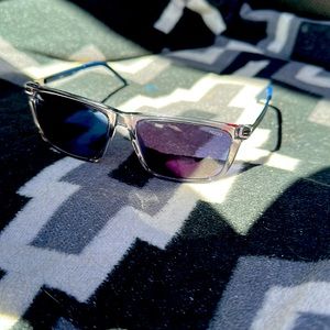 Hugo Boss sunglasses, clear blue square frame, blue lenses.